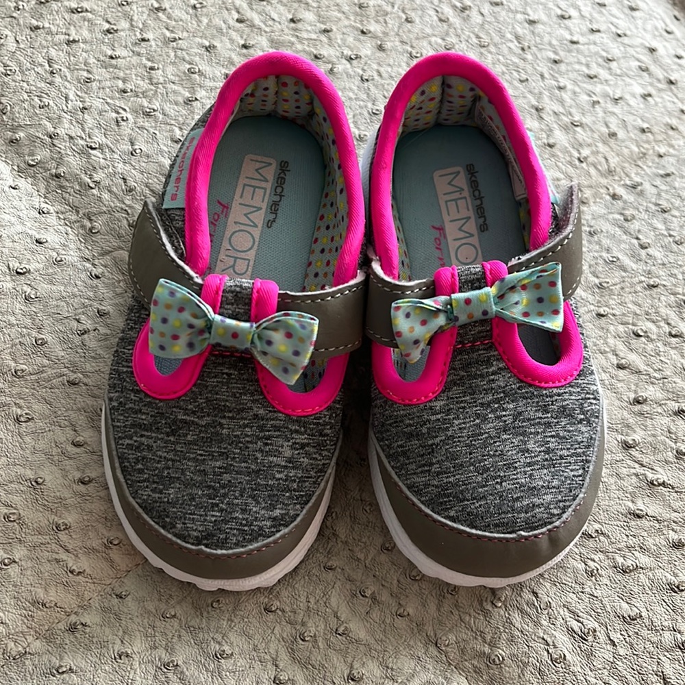 Skechers baby/walker shoes.  Like new, worn once in house.
